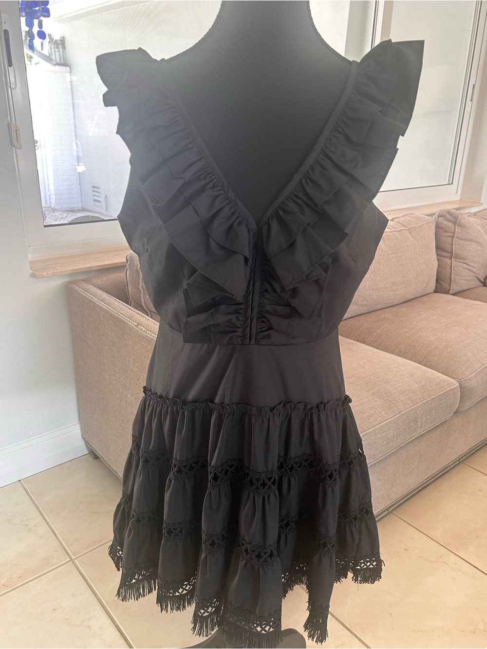 Black Ruffle V-Neck Tiered Midi Dress, Sold at Monkee’s